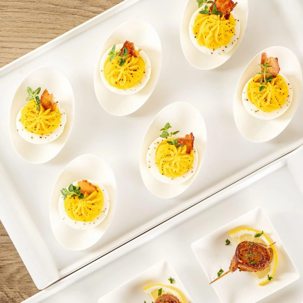 Restaurantware Pulp Safe No PFAS Added 3.2 x 2.1 Inch Tasting Dishes 100 Disposable Dishes - Home Compostable Microwavable And Freezable White Bagasse Food Dishes Egg Shape For Appetizers