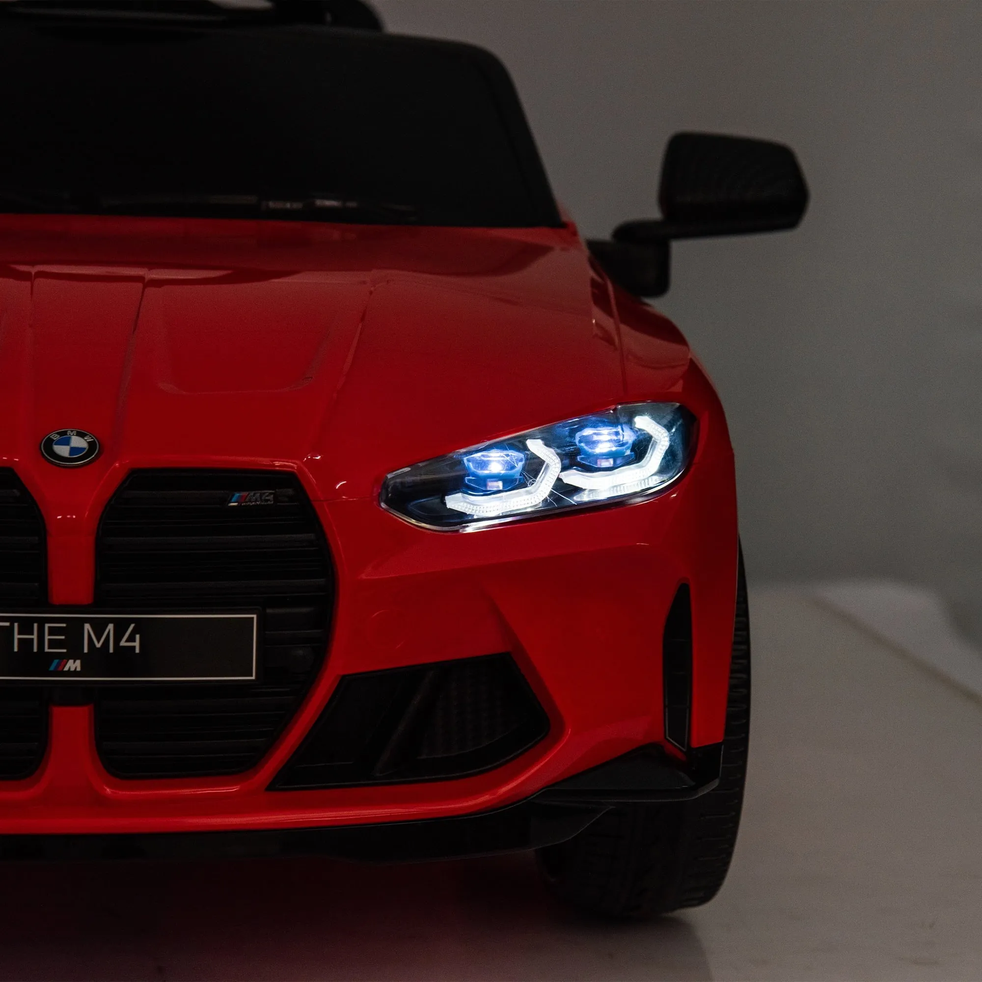 Track 7 12V Ride on Car, Licensed BMW M4 Electric Car, Kids Ride on Car with Remote Control, Bluetooth, Lights, Portable Handle, Red